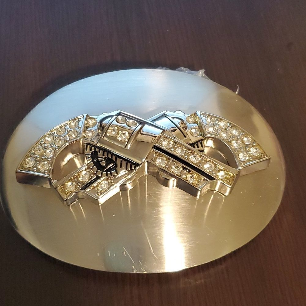 Double revolver oval belt buckle